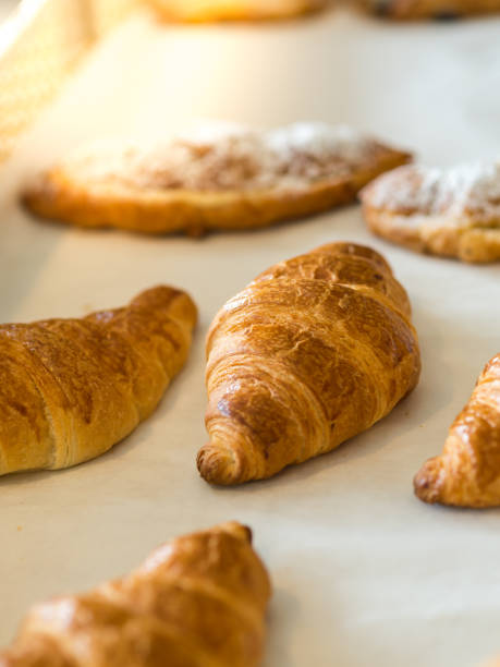 istock croissants in basket ready for sell. 916537772