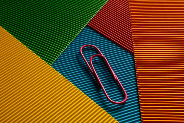 Texture of cardboard and paper clip