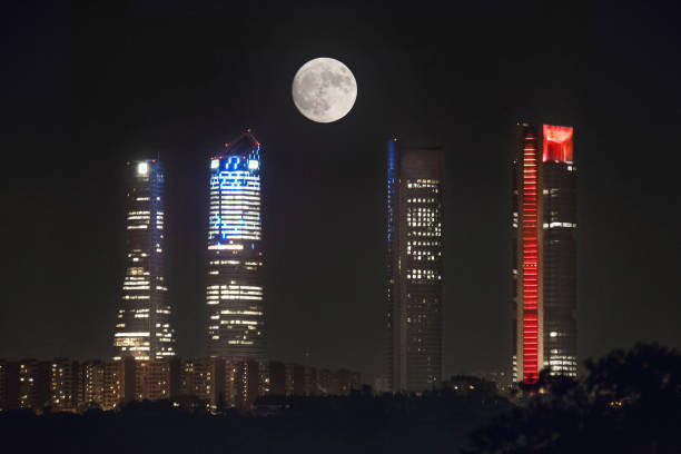 istock Full moon over Madrid skyline at night, Spain. 916541766