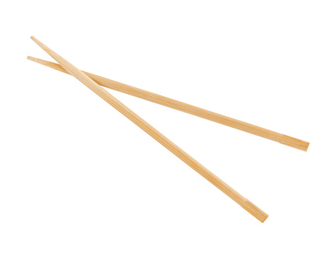 Pile of wooden chopsticks isolated on white background