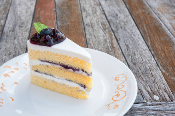 istock Blueberry cheese cakes in white plate on wooden table 916551698