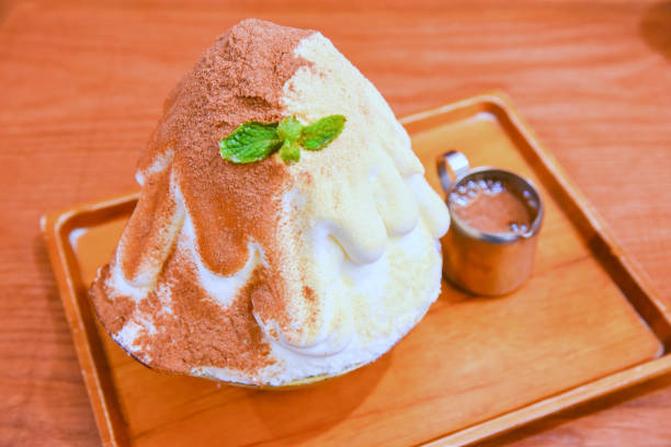 istock kakigori with milo and white malt on wooden disk 916551840