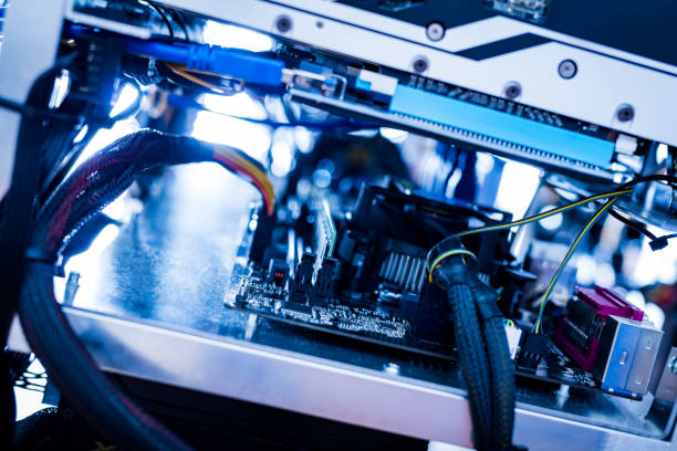 istock Wires of bitcoin mining machine in a close-up shot. 916553096