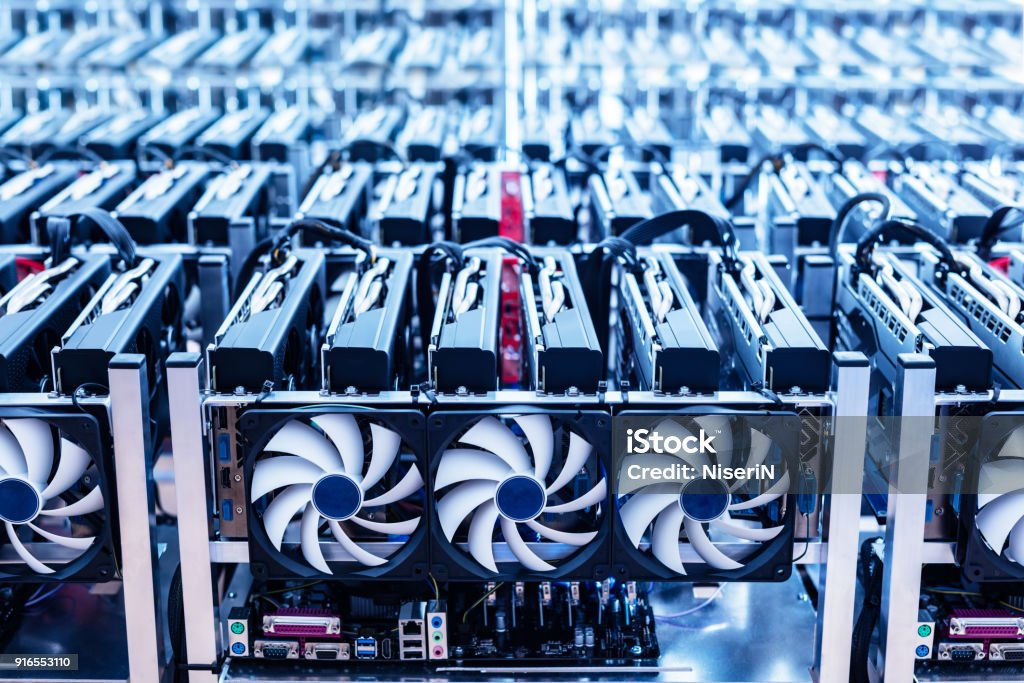 Bitcoin mining farm. IT hardware. Bitcoin mining farm. IT hardware. Electronic devices with fans. Cryptocurrency miners. Cryptocurrency Mining Stock Photo