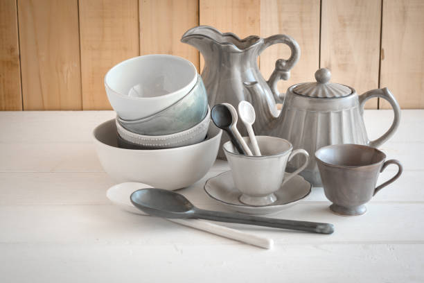 istock white bowl and spoon ceramic on a gray background 916555334