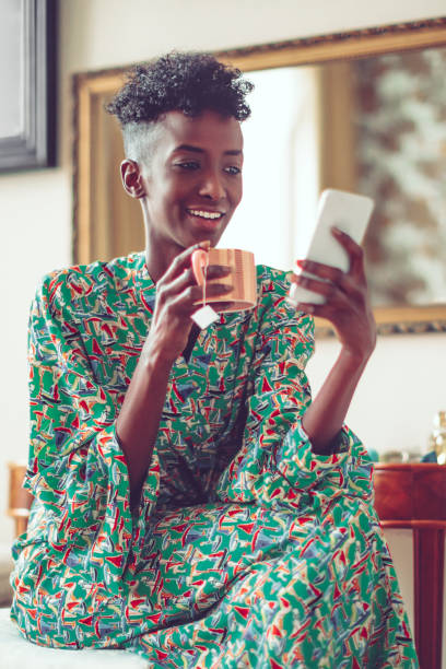 istock Young woman at home 916555542