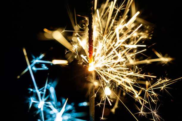istock Burning sparkler isolated on black background blur 916568192
