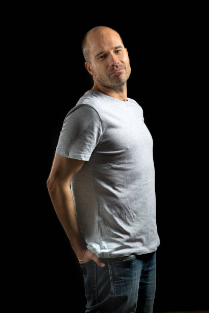 istock Man with hands in his pockets 916571188