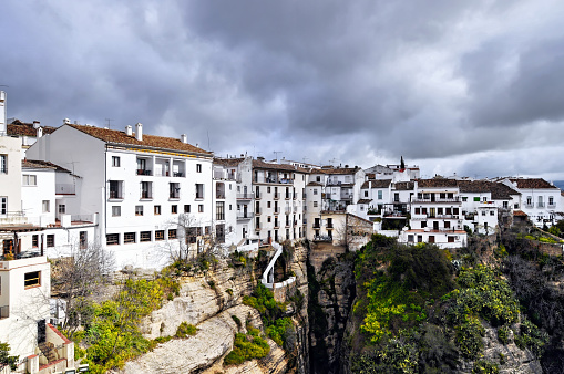 Houses at the edge of the cliff in Ronda, a town in the Malaga province of Andalusia.