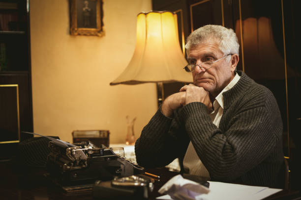 istock Pensive Retro Senior Man Writer 916579078