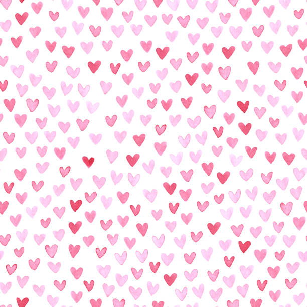 istock Seamless Valentine's day heard pattern in shades of pink and red painted with watercolors 916579094