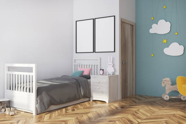 istock Blue nursery interior, armchair and posters side 916586500