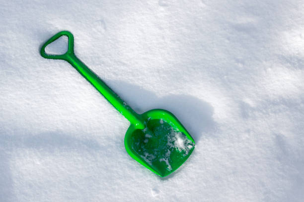 toy shovel in the snow