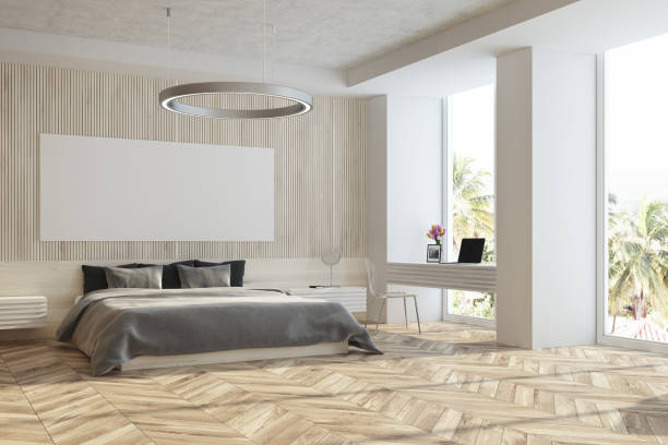 istock Wooden and white bedroom with poster side 916586814