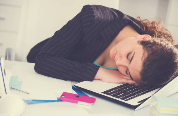 istock Female manager is sleeping after productive day at work 916586928