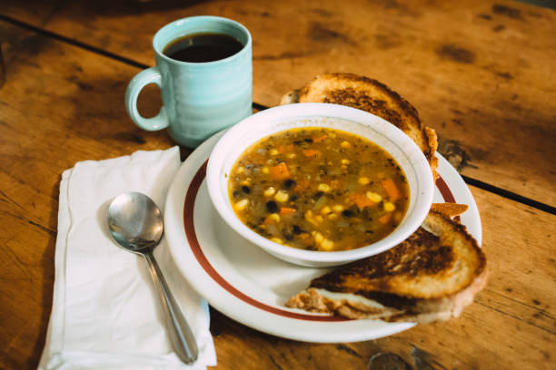 istock Tasty Vegetable soup with toasts on the table. 916592278