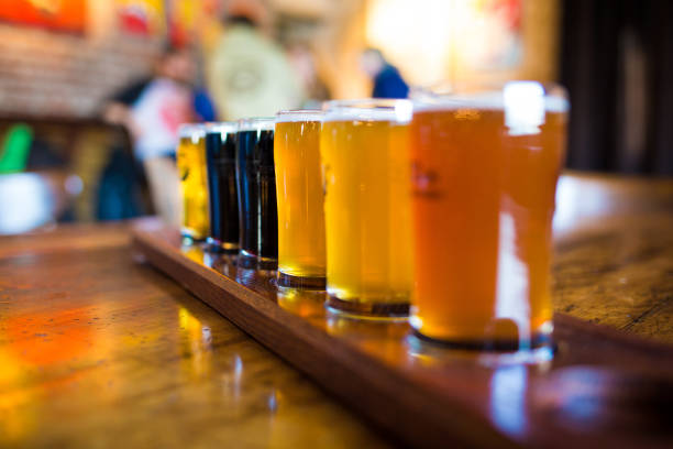 A variety set of craft beers light and dark on the table