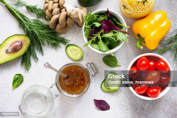 Superfoods And Homemade Salad Dressing Vinaigrette With Mustard Honey Balsamic Vinegar And Olive Oil On A Stone Or Slate Background Top View Stock Photo - Download Image Now