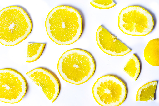 Sliced lemons background pattern isolated flay lay