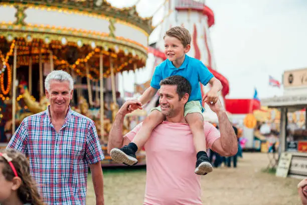 Photo of Multi-Generation Males at the Fairground