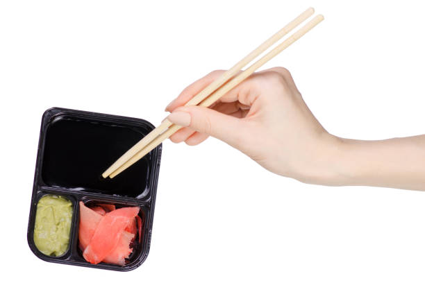 istock Sticks for sushi soy sauce ginger wasabi 916606744