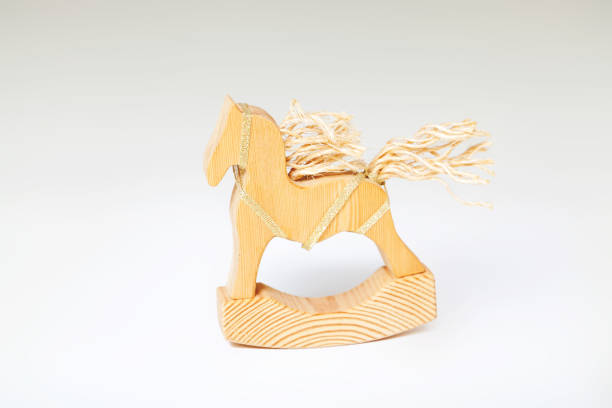 istock Wooden horse on white background 916610198