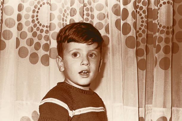 istock Sepia toned vintage boy 916611220