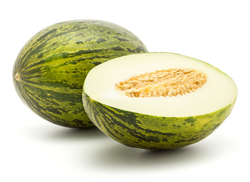 Melon Piel de Sapo (Santa Claus Christmas variety) isolated on white background green striped outer rind one whole and section half with seeds\