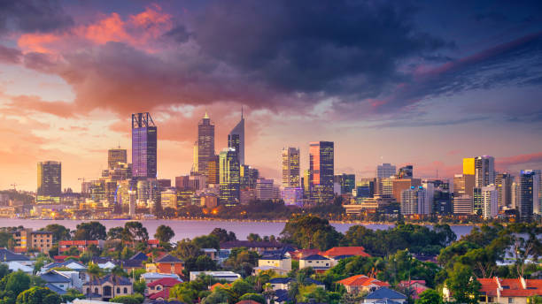Perth. Panoramic aerial cityscape image of Perth skyline, Australia during dramatic sunset. perth australia photos stock pictures, royalty-free photos & images
