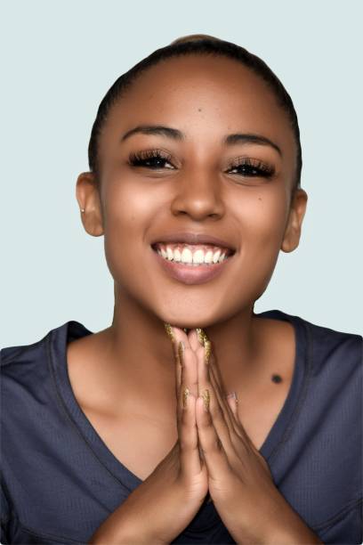 istock Youthful Colombian Female Praying 916621490