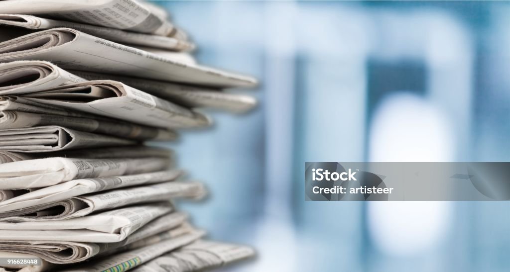 Newspaper. Pile of newspapers on background Newspaper Stock Photo