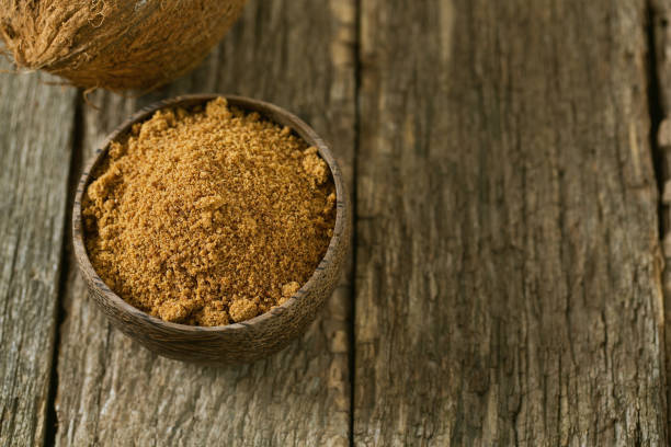 istock coconut palm sugar on wooden surface 916628456