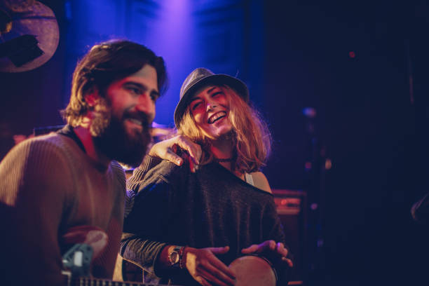istock Guitarist and his girlfriend 916629800