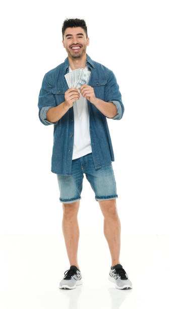 istock Casual man holding US cash 916643996