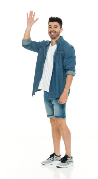 istock Casual man waving 916644114