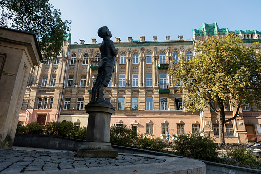 Vilnius, Lithuania - September 28, 2017: Romain Gary statue (sculptor Romualdas Kvintas) in front of the house, where he once lived. Gary was a famous french writer.