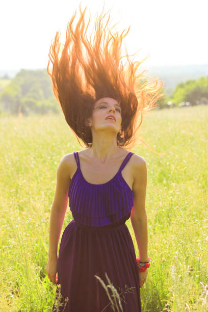istock Beauty young girl outdoors enjoying nature 916649846