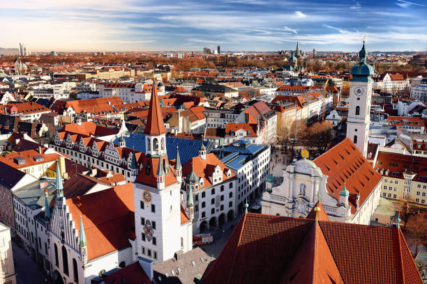 istock Munich center panoramic cityscape view with Old Town Hall and Heiliggeistkirche 916657068