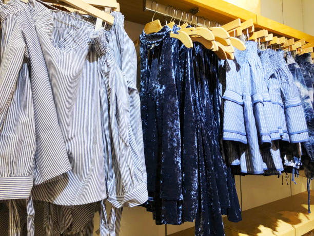 istock Modern clothes in a shop on a hanger. 916657496
