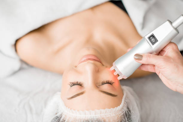istock Woman during a facial massage 916660088