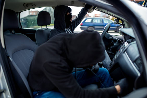 istock Car thief, car theft 916664660