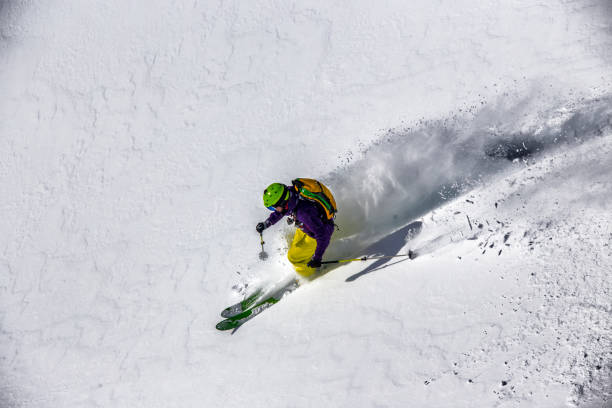 istock extreme skier in powder snow 916669388