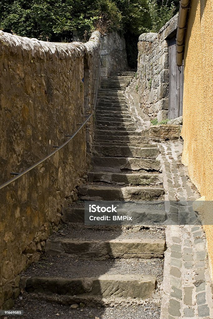 Winding Stairs An ancient long winding stair in the medieval burgh of Culross, Fife, Scotland Alley Stock Photo