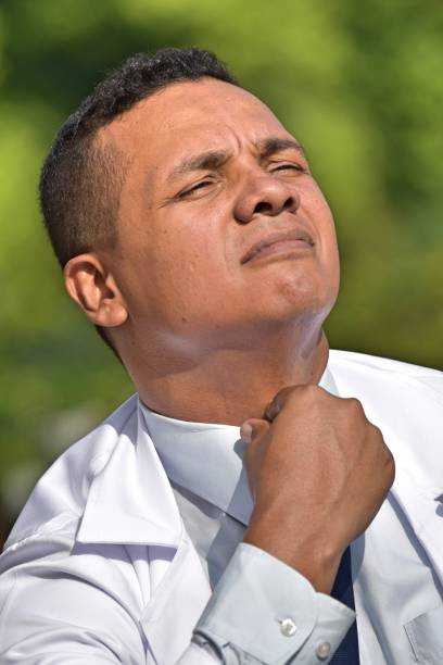 istock Confident Male Medic Wearing Lab Coat 916699336