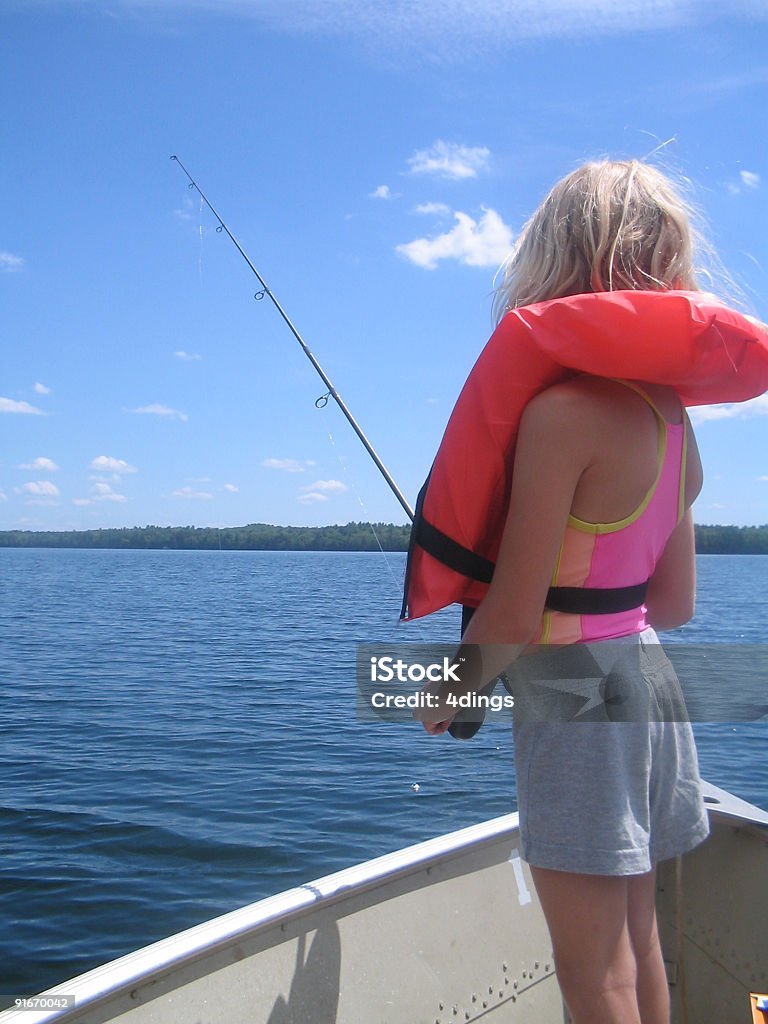 Chica de la chaqueta de pesca - Foto de stock de Actividad libre de derechos