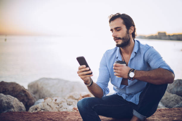 istock Man relaxing near the sea 916701032