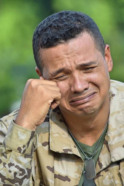 istock Crying Veteran Soldier 916701380