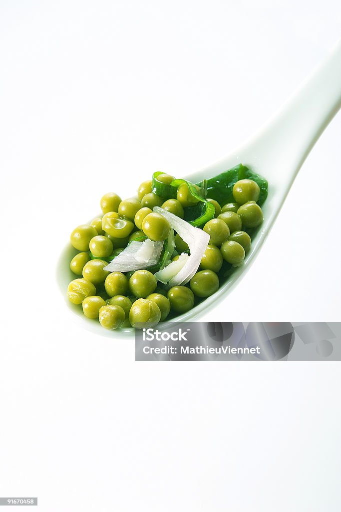 Pois dans une cuillère - Photo de Aliment libre de droits