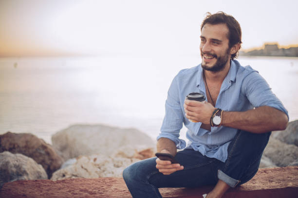 istock Man relaxing at the beach 916704794