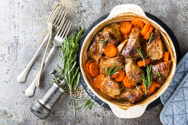 istock Meat baked with carrots in the oven 916714316